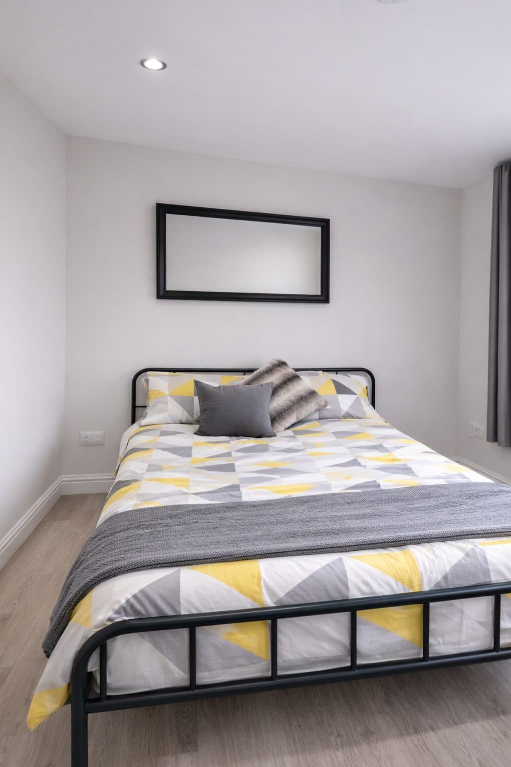 Double bedroom with new bedding and full-length mirror