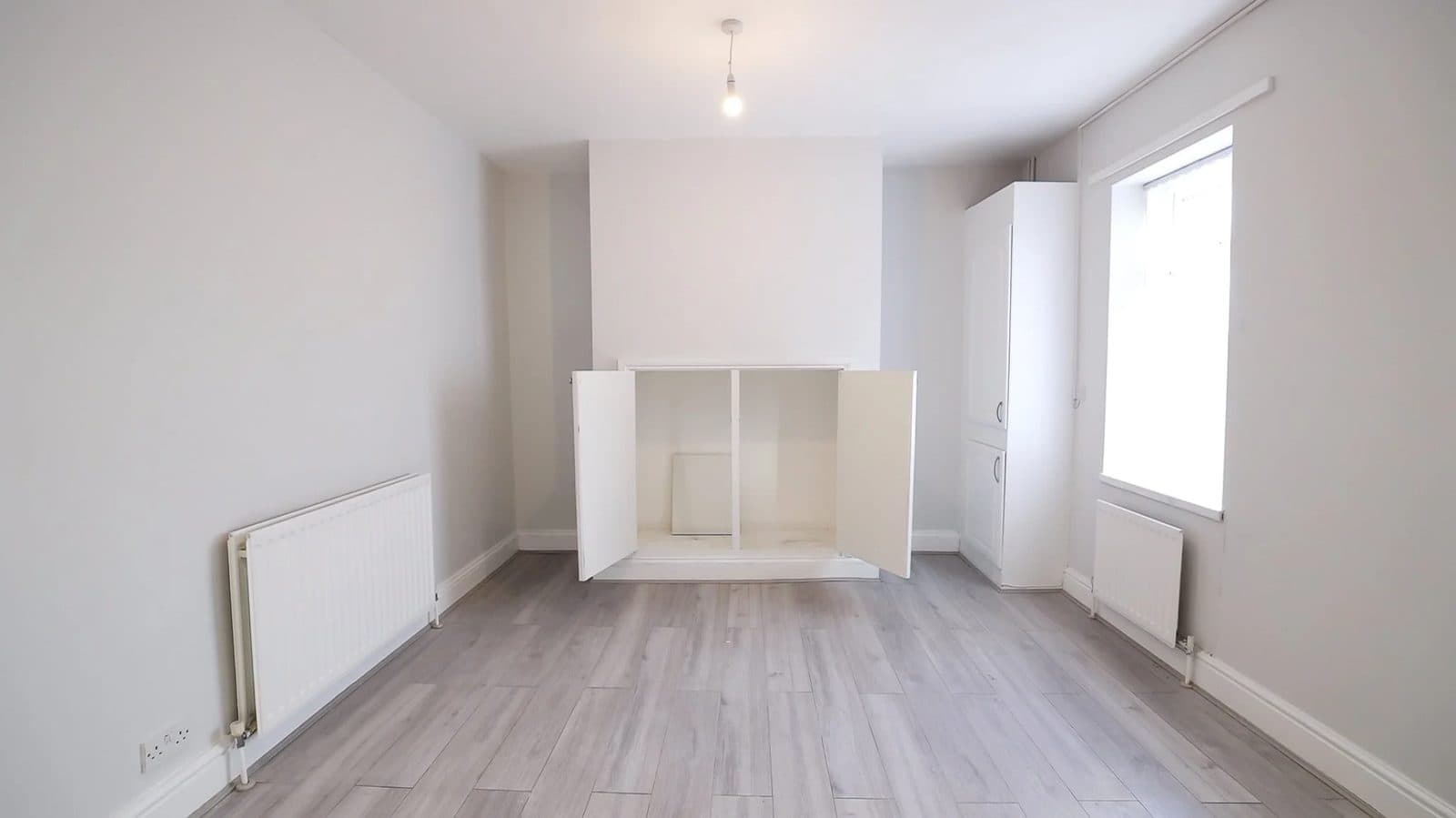 Open-plan living and dining space after renovation